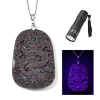 Natural Yooperlite 185.00 ctw Carved Dragon Pendant Necklace in Stainless Steel 20 Inches with Free UV Flash Light