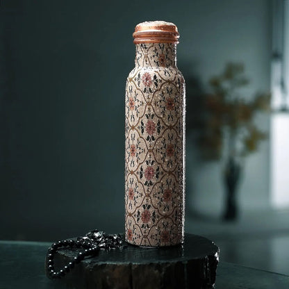 Multi Color Printed Copper Bottle with Shungite Infuser and Shungite Bracelet  Bottle Size: Height- 10.6 inches, Diameter- 2.75 inches, Bracelet - 6mm Bottle Capacity: Approx. 32 Oz.