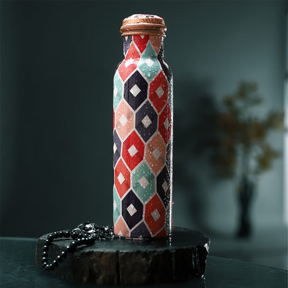 Multi Color Printed Copper Bottle with Shungite Infuser and Shungite Bracelet  Bottle Size: Height- 10.6 inches, Diameter- 2.75 inches, Bracelet - 6mm Bottle Capacity: Approx. 32 Oz.